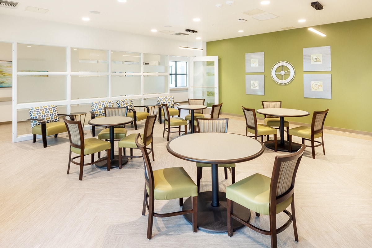The dining area and soft seating of the Pacific Villas facility